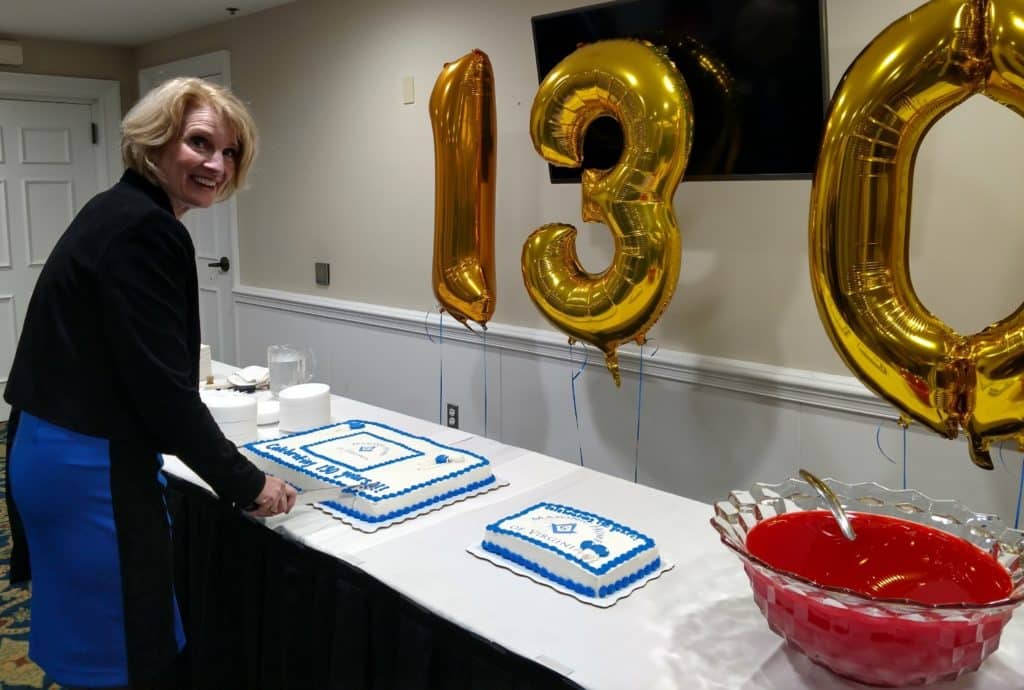 Cutting a cake at table